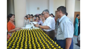 Distributing basic commodities to in-service teachers,  staff and Daily wagers